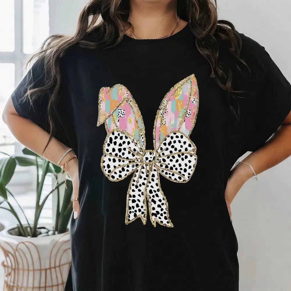 There Are Colorful Geometric Patterns On The Cartoon Rabbit Ears, With Gold Decorations On The Edges And A Big Bow With Black And White Spots, Which Is Lively And Cute, And A Casual T-Shirt.