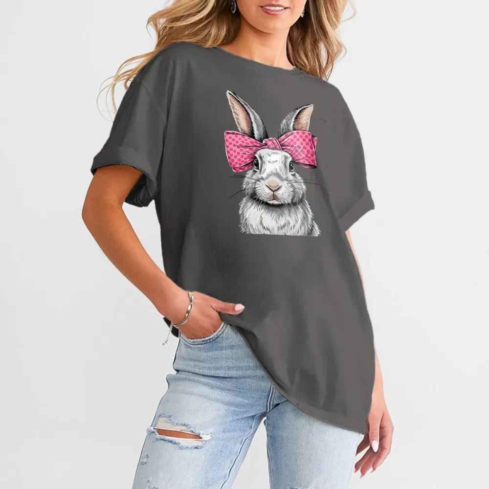 A Cartoon Rabbit With Ears Erected, Wearing A Pink Bow With White Polka Dots, Casual T-Shirt