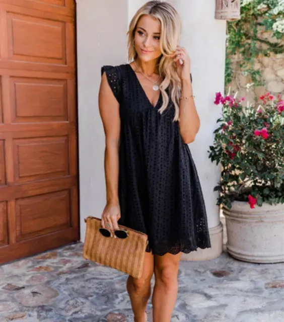 European and American women's new lace jacquard hollow V-neck dress women have pocket cloth shorts.