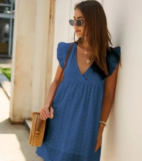 European and American women's new lace jacquard hollow V-neck dress women have pocket cloth shorts.