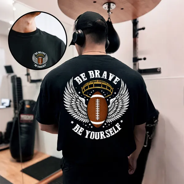 There Are Wings On Both Sides Of The Football, The Outline Of A Football Helmet, And The Words 