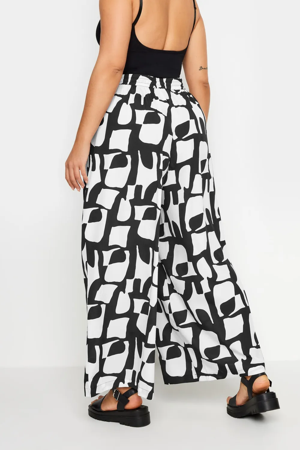 Yours Curve Black Leaf Print Drawstring Wide Leg Trousers
