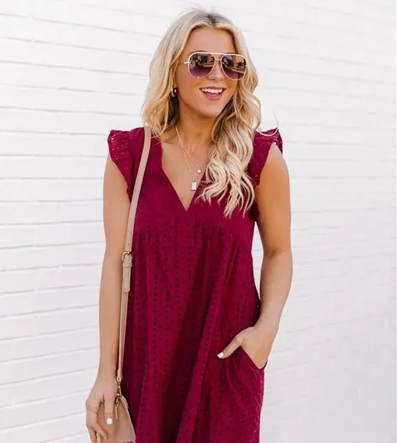 European and American women's new lace jacquard hollow V-neck dress women have pocket cloth shorts.