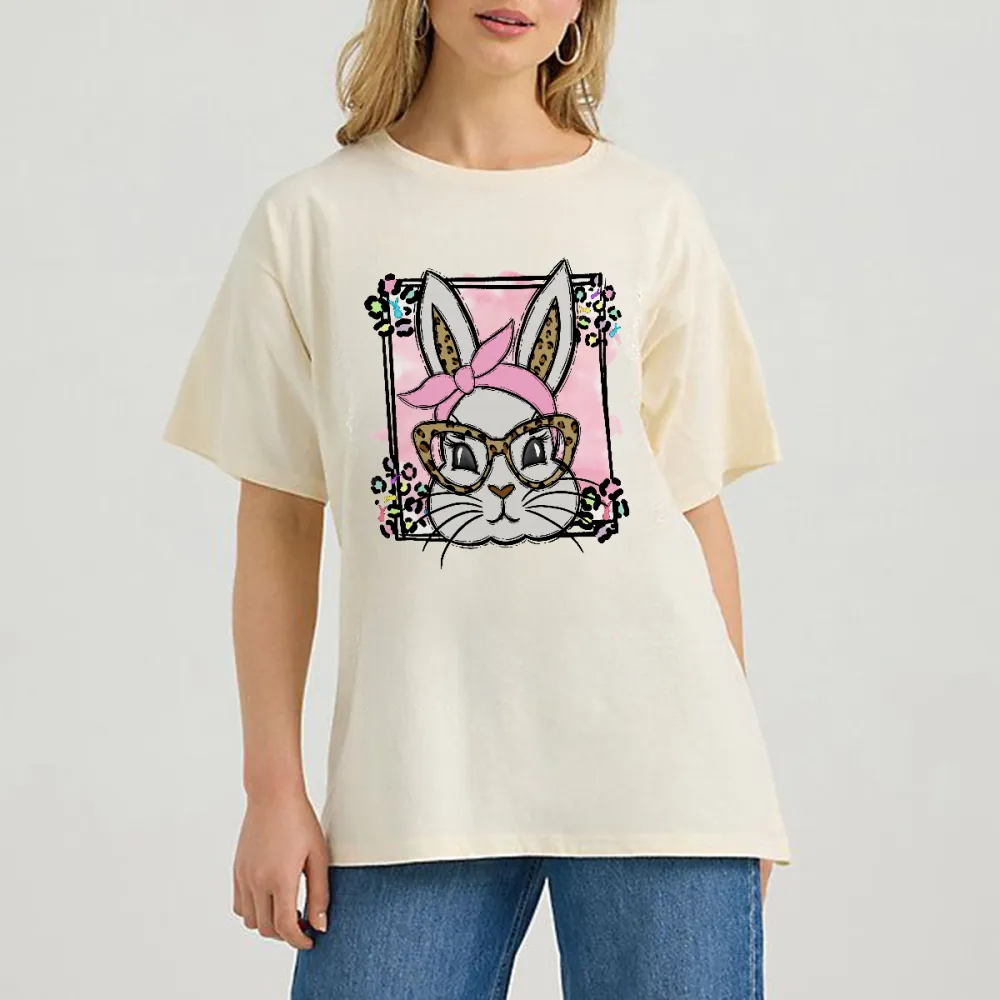 A Cartoon Rabbit Image. The Rabbit Is Wearing A Pink Headscarf, Leopard Print Glasses, A Pink Checkered Background, Colorful Flowers Around, And A Casual T-Shirt.