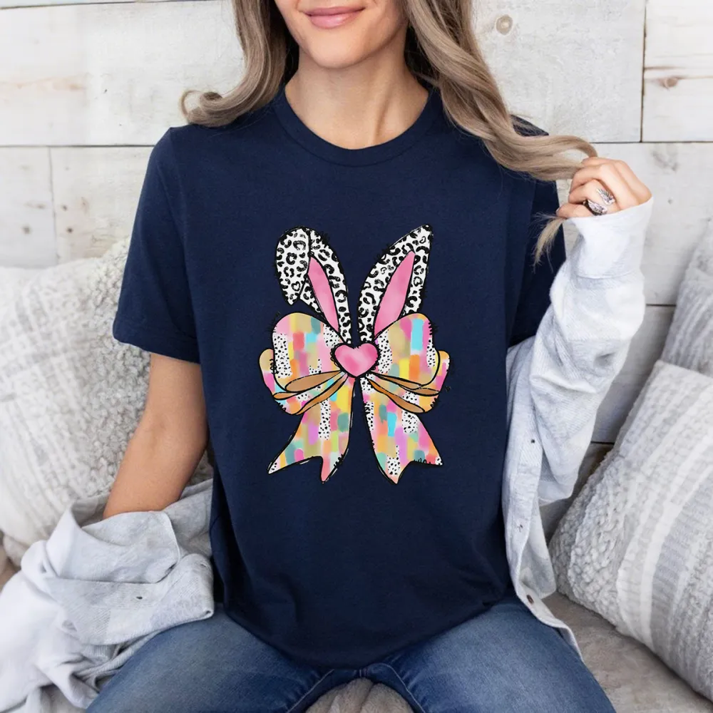 A Colorful Plaid Bow In The Shape Of Rabbit Ears, With Leopard Print Decorations And A Pink Heart Pattern On The Ears, And A Casual T-Shirt.