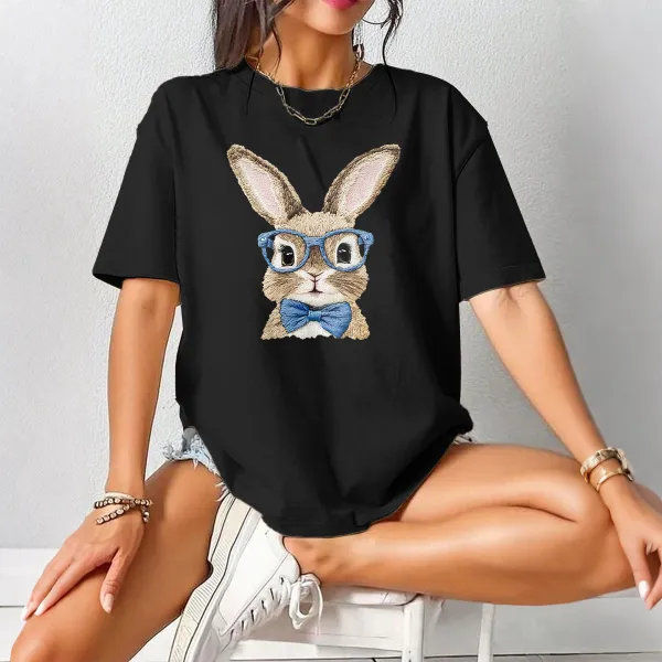A Rabbit Pattern Wearing Blue Glasses And A Blue Bow Tie Looks Cute And Stylish On A Casual T-Shirt.