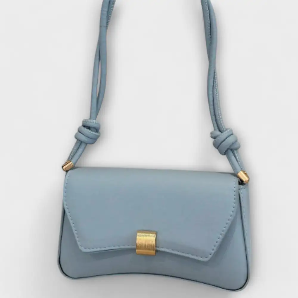 Latch Front Suede Handbag
