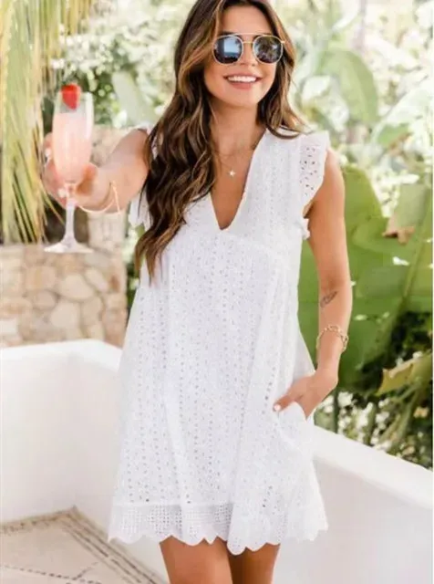 European and American women's new lace jacquard hollow V-neck dress women have pocket cloth shorts.