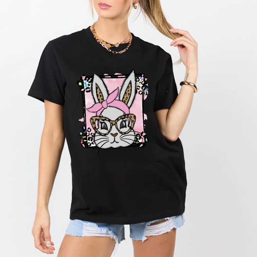 A Cartoon Rabbit Image. The Rabbit Is Wearing A Pink Headscarf, Leopard Print Glasses, A Pink Checkered Background, Colorful Flowers Around, And A Casual T-Shirt.