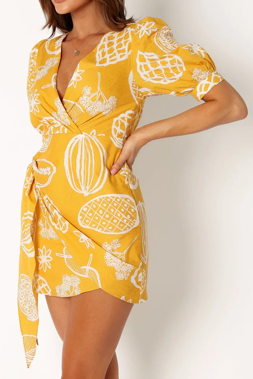 YELLOW PRINTED PATTERN WRAP MINI DRESS