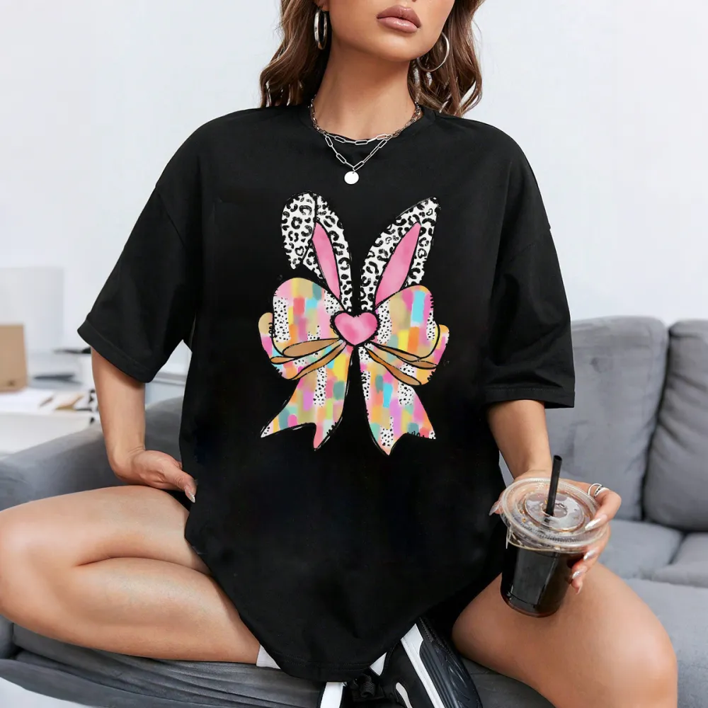 A Colorful Plaid Bow In The Shape Of Rabbit Ears, With Leopard Print Decorations And A Pink Heart Pattern On The Ears, And A Casual T-Shirt.