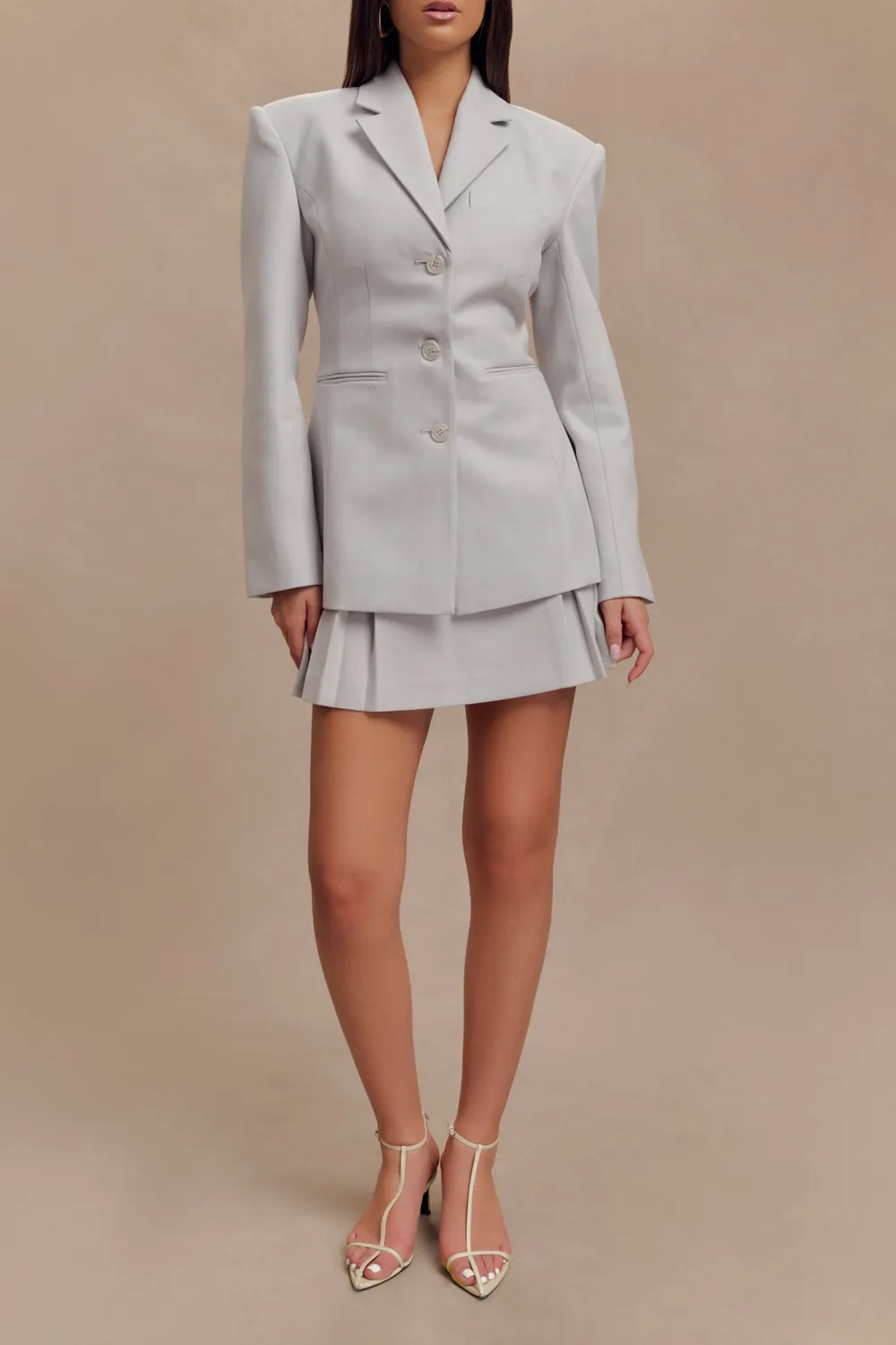 Pleated Buckle Mini Skirt