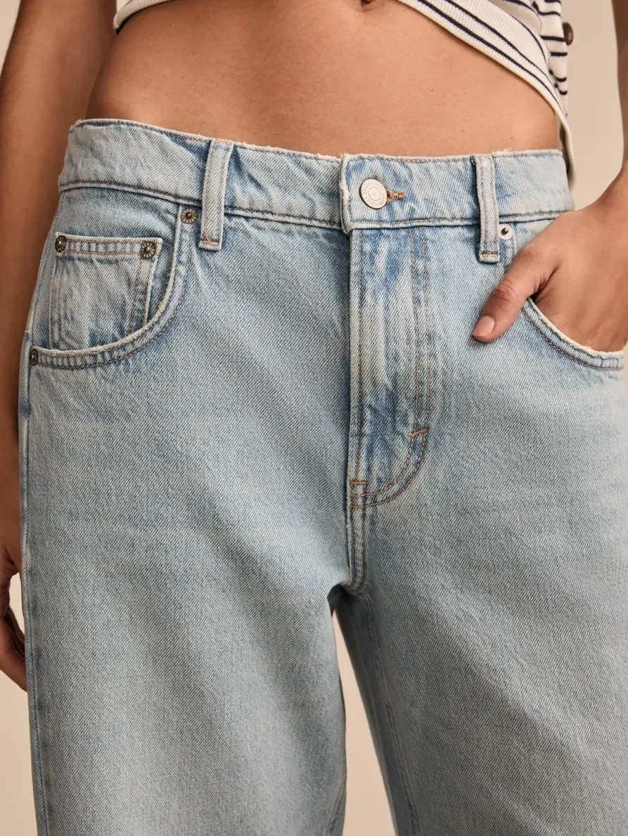 Distressed Light Wash Denim Barrel leg