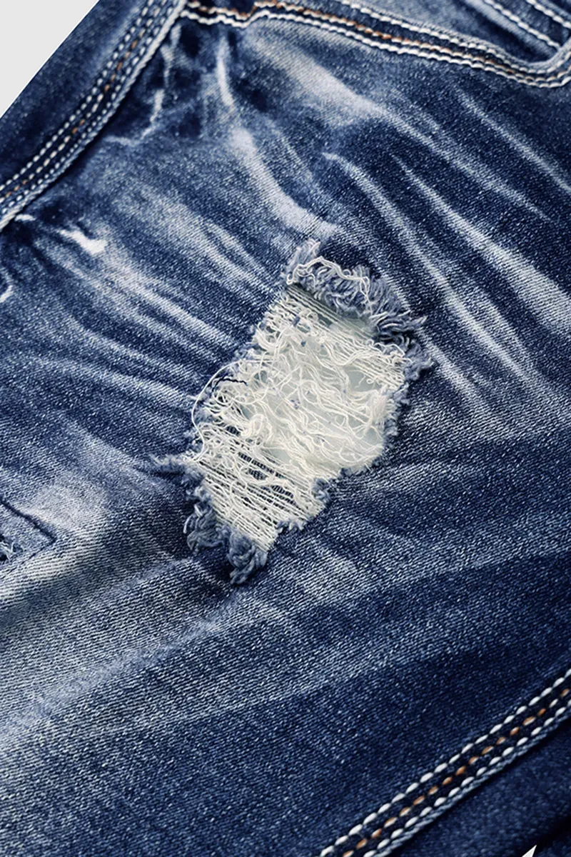 Ripped Contrast Stitch Mid Rise Bootcut Jeans