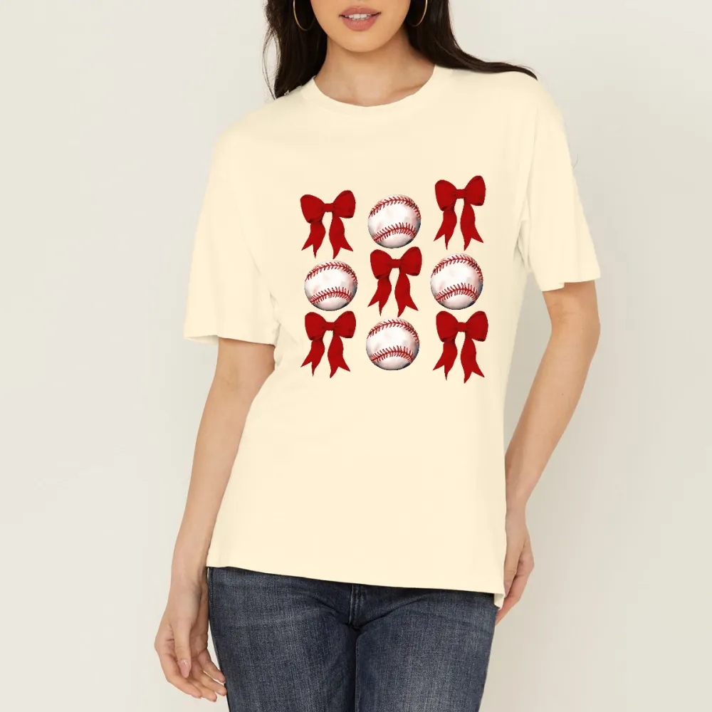 A Casual T-Shirt With Alternating Red Bow And Baseball Patterns.