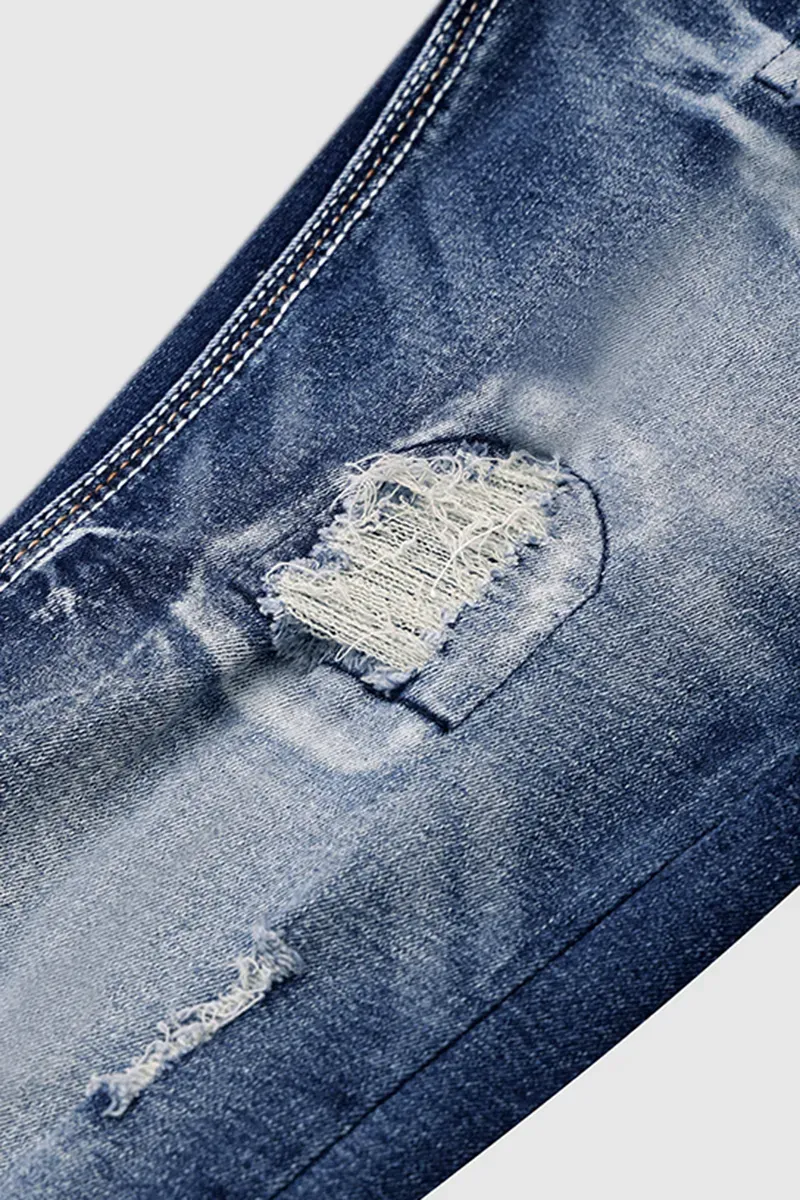 Ripped Contrast Stitch Mid Rise Bootcut Jeans