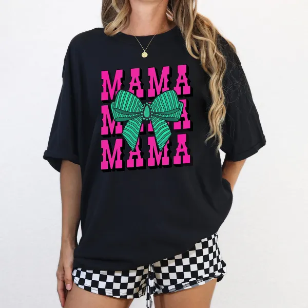 “MAMA” , The Slogan Is Repeated In Pink Capital Letters And A Green Striped Bow Pattern, Casual T-Shirt.