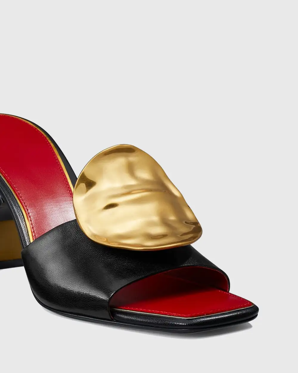 Metal Coin Asymmetrical Slippers in Black
