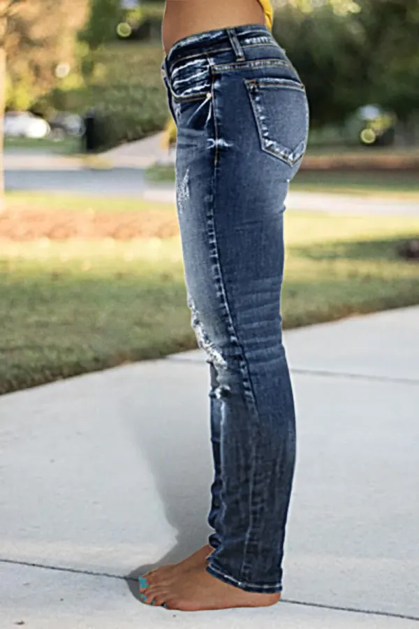 Distressed Low Rise Skinny Jeans