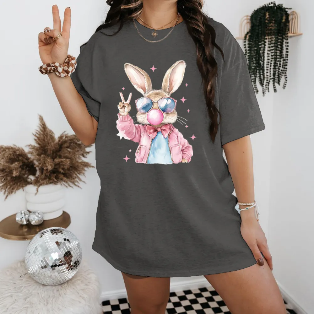 A Cartoon Rabbit Pattern, Wearing Sunglasses, A Pink Jacket And Blue Inner Wear, A Pink Bow Tie, Blowing Bubble Gum In His Mouth, And Making A 