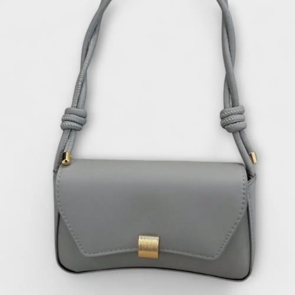 Latch Front Suede Handbag