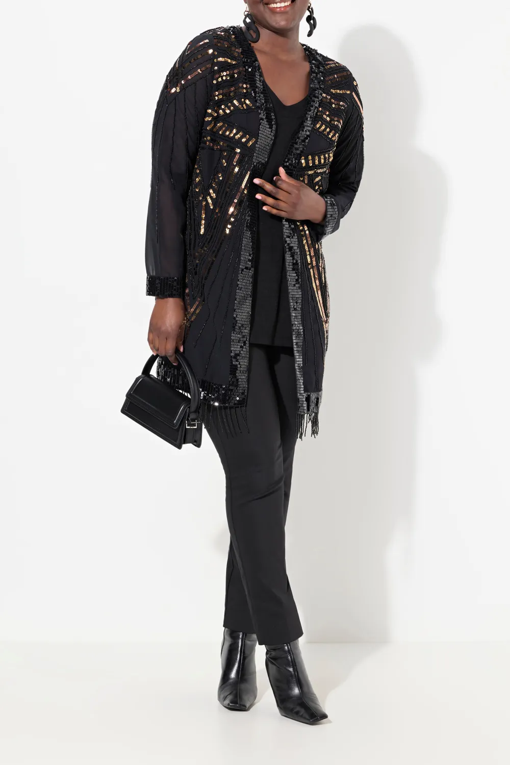 Long Sleeved Jacket With Tassel