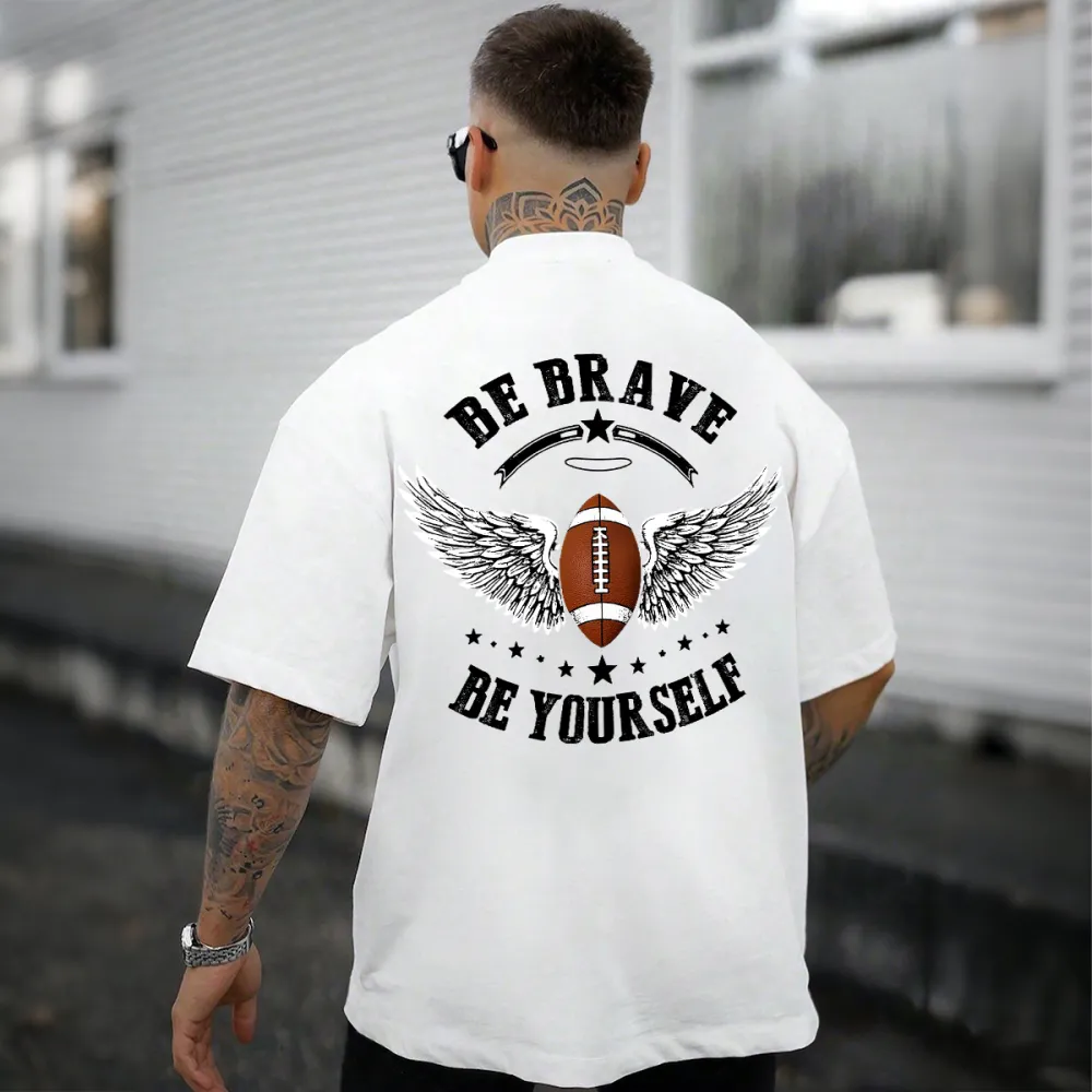 A Rugby Ball With Wings On Both Sides And A Small Halo Above. The Pattern Is Surrounded By The English Words 