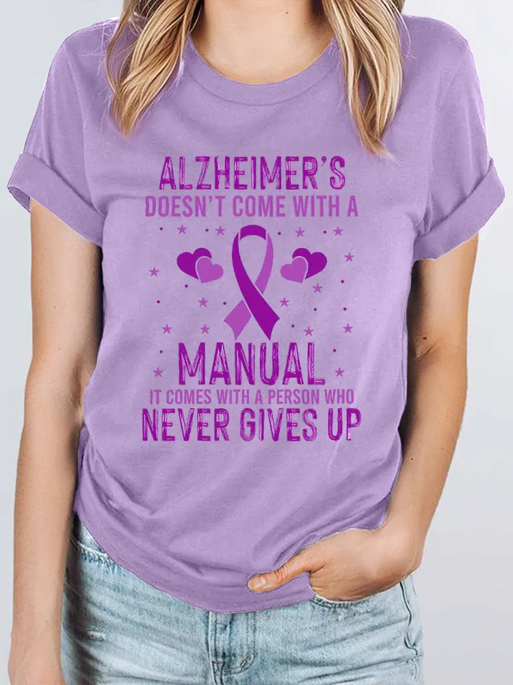 Alzheimer's Doesn't Come With A Manual It Comes With A Person Who Never Gives Up Women's T-Shirt