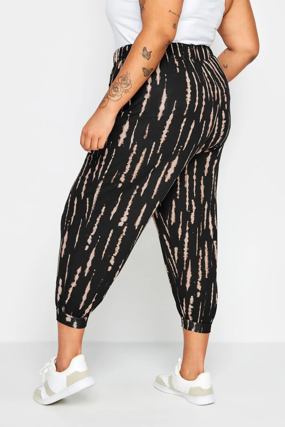 YOURS Curve Beige Brown Leaf Print Cropped Harem Trousers