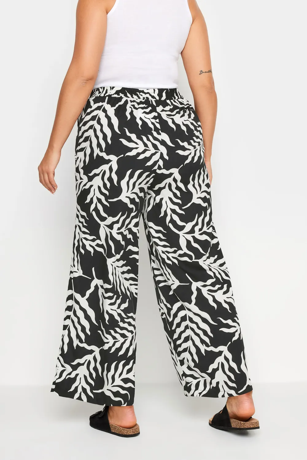 Yours Curve Black Leaf Print Drawstring Wide Leg Trousers